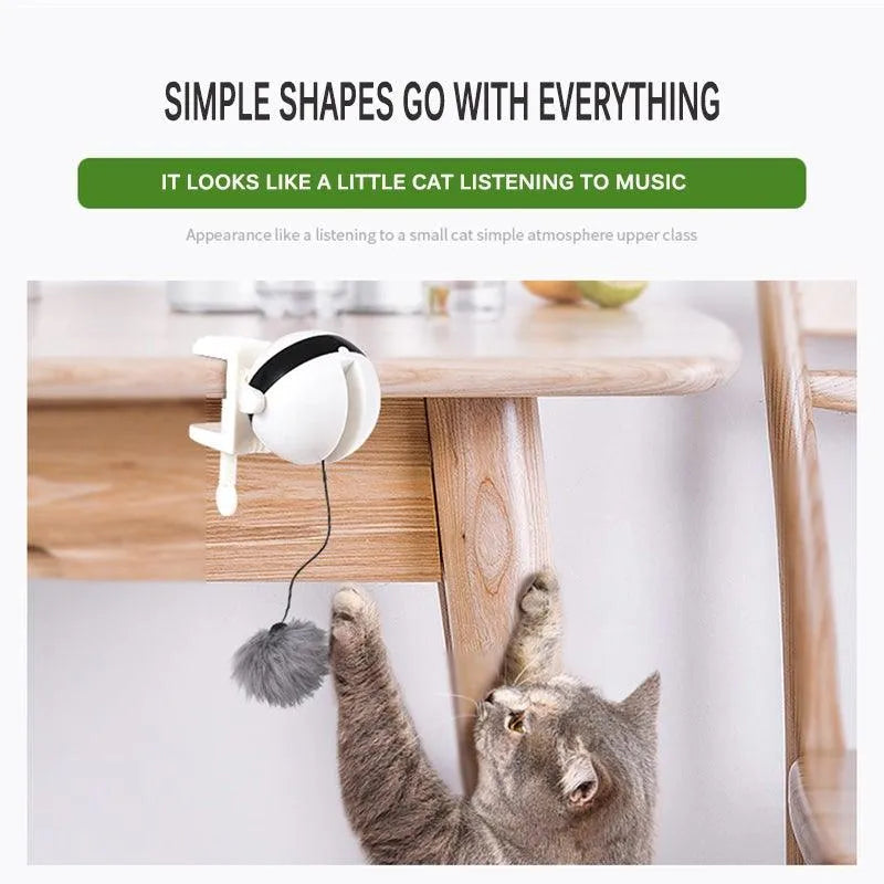 Electric Automatic Lifting Motion Cat Toy by Stevvex in white, designed as a puzzle ball for engaging feline exercise.