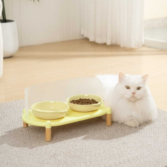 MangoPets elevated cat dining table in yellow with two bowls for comfortable feeding