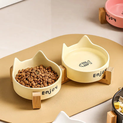 Elevated Wooden Cat Bowl Set by Purrfect Pet Kingdom in pink, featuring a double wooden frame for healthy dining posture.