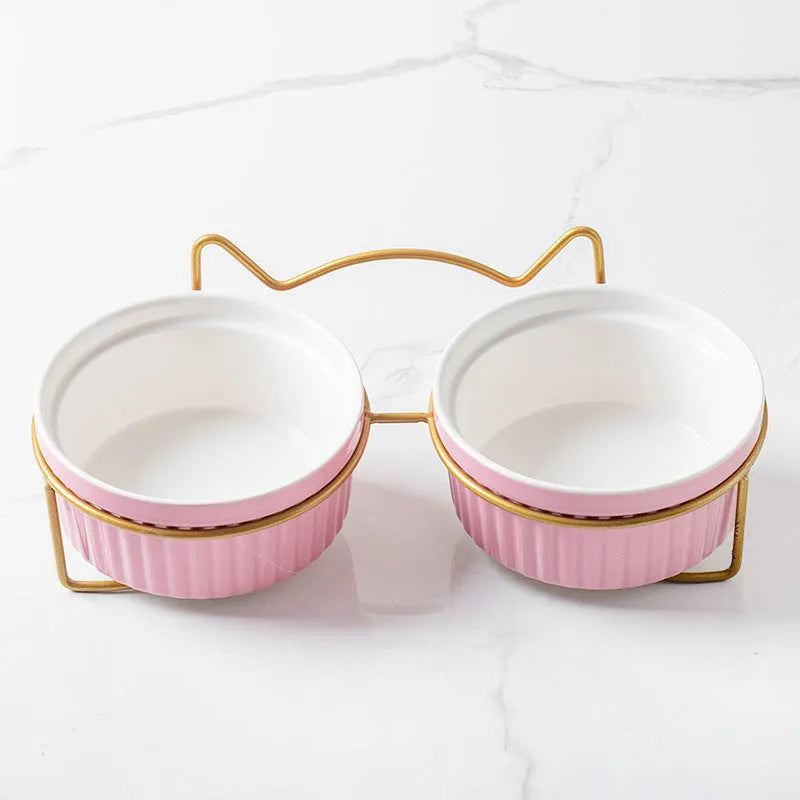 Ergonomic Elevated Ceramic Cat Bowl by Purrfect Pet Kingdom in Gorgeous Pink with Double Bowl Gold Bracket for spine relief.