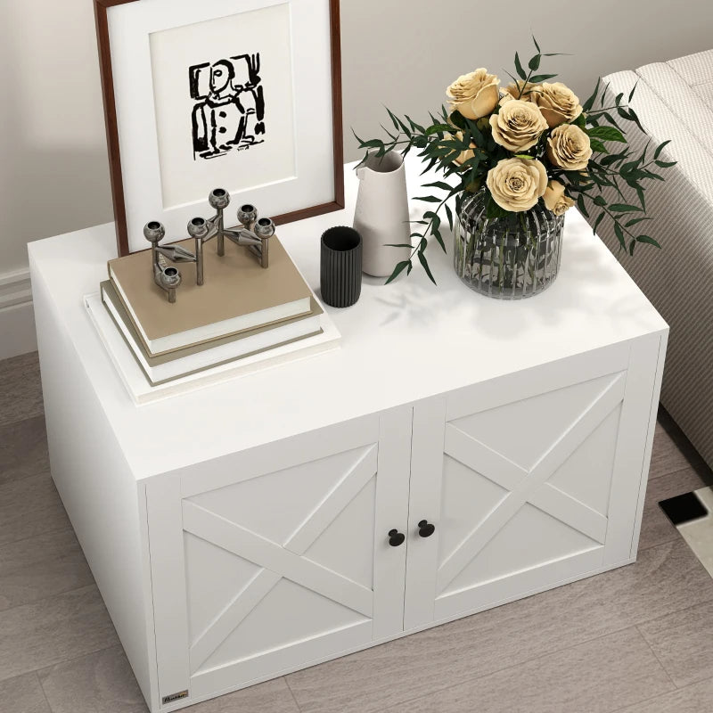 White PawHut litter box enclosure with X-frame barn doors and black knobs, styled as a decorative side table.