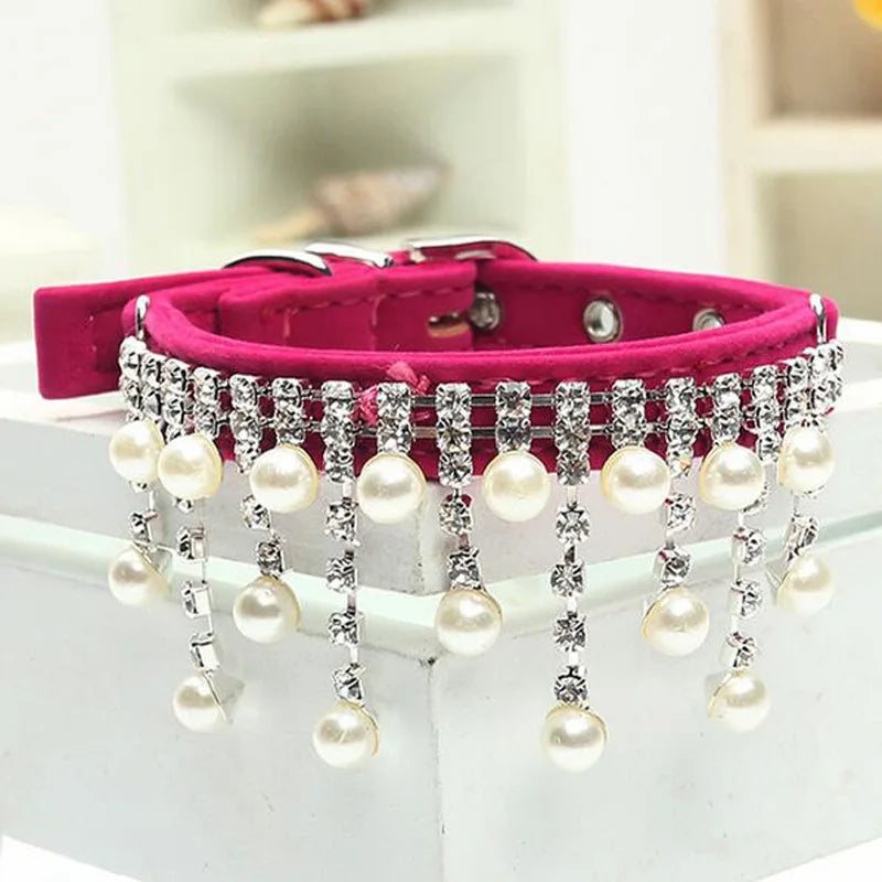 Fancy cat collar for special occasions featuring pearls and decorative chains for stylish pets