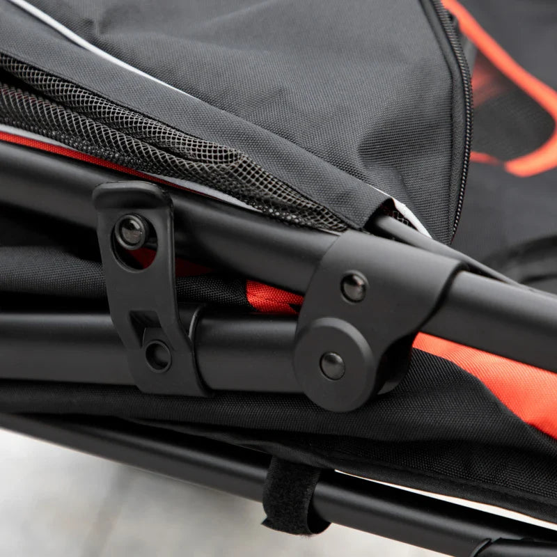 Close-up of a foldable dog stroller for large pets featuring a durable frame and mesh windows