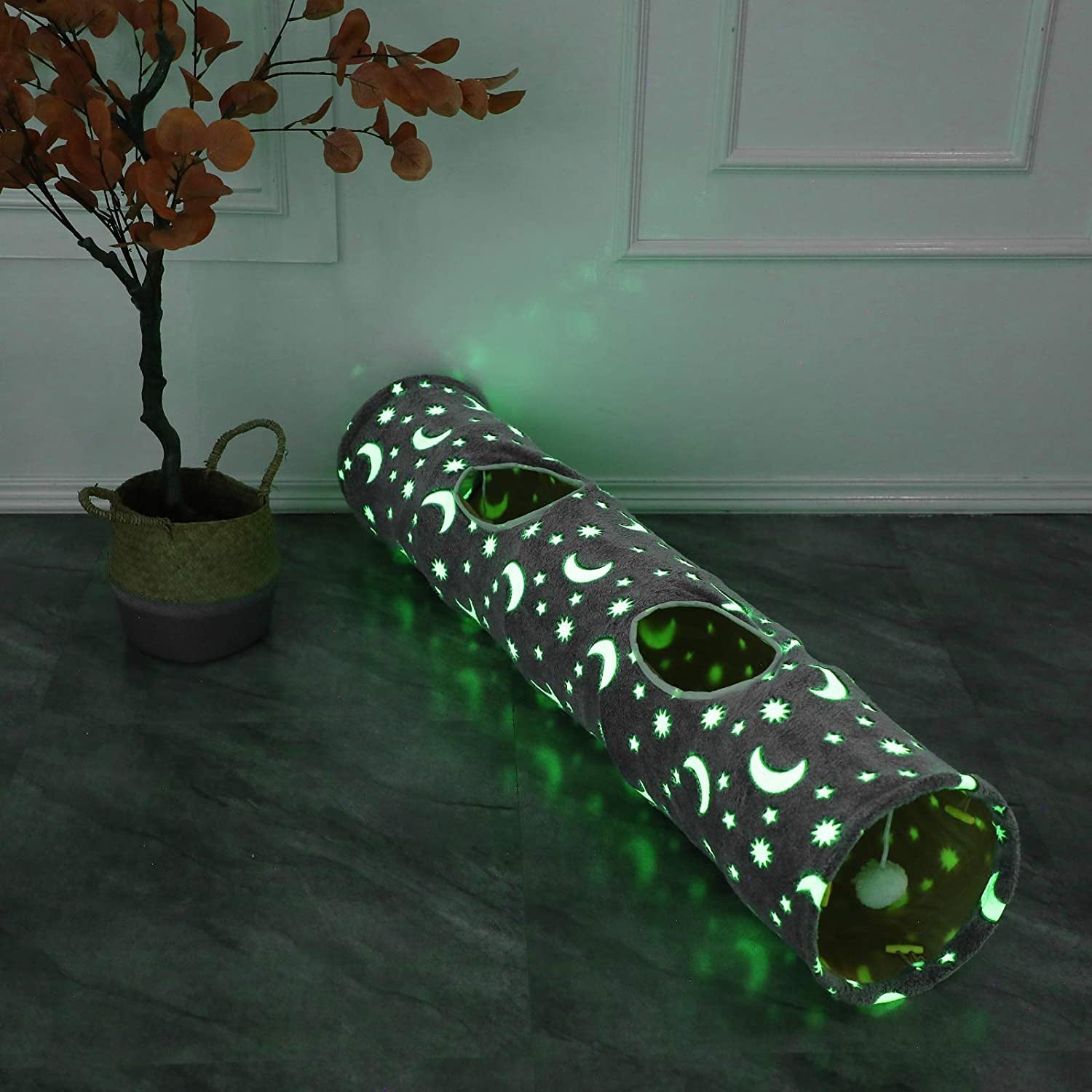 Glow in the dark cat tunnel with star and moon patterns for playful cats at Purrfect Pet Kingdom