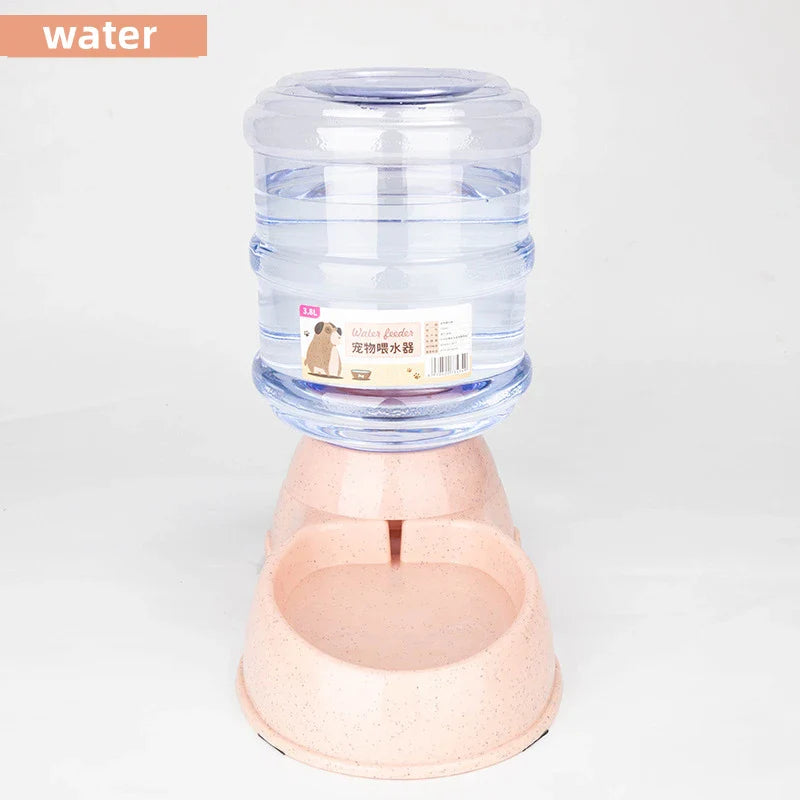 Gravity pet water and food dispenser in pink with a large water bottle and a sturdy base for easy feeding