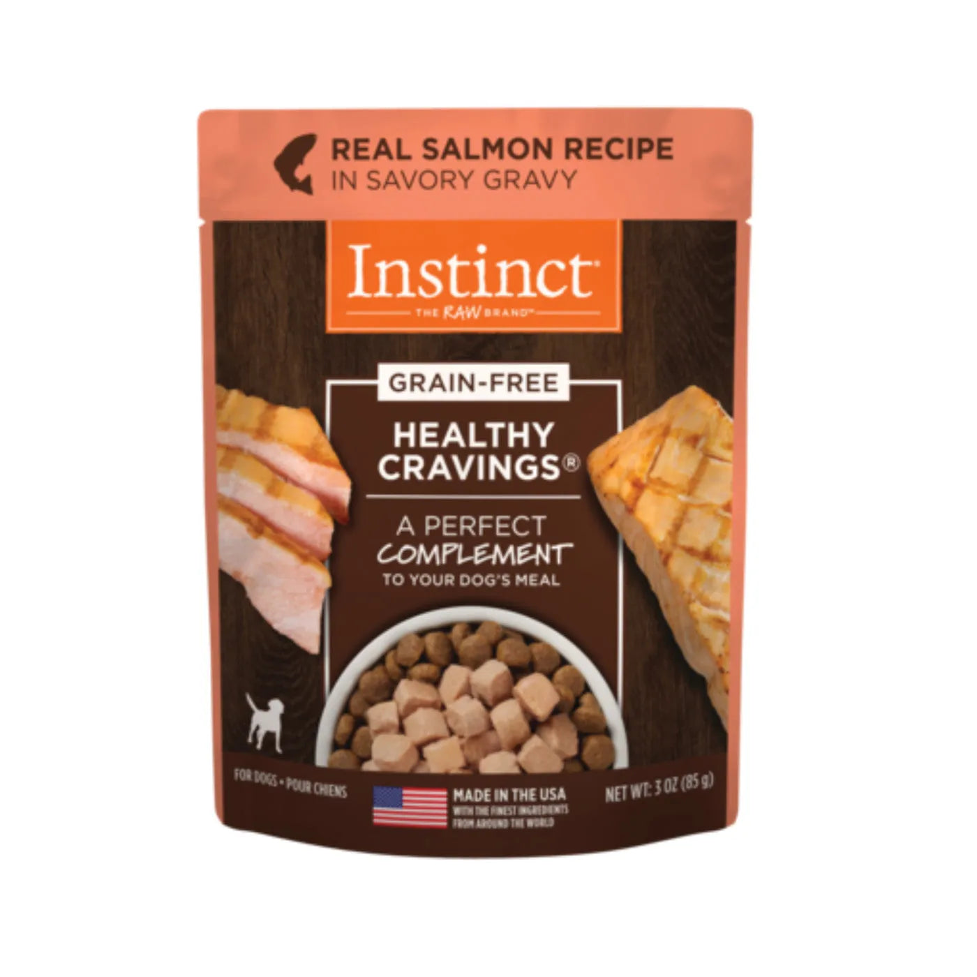 Instinct Healthy Cravings Salmon Dog Food Pouch by The Family Pet, 3oz, featuring a vibrant salmon color and appealing pac...