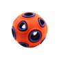 Purrfect Pet Kingdom interactive dog toy with lights orange ball with purple holes for puzzle play