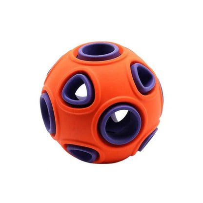 Purrfect Pet Kingdom orange and purple interactive dog toy with lights and multiple holes for puzzle play