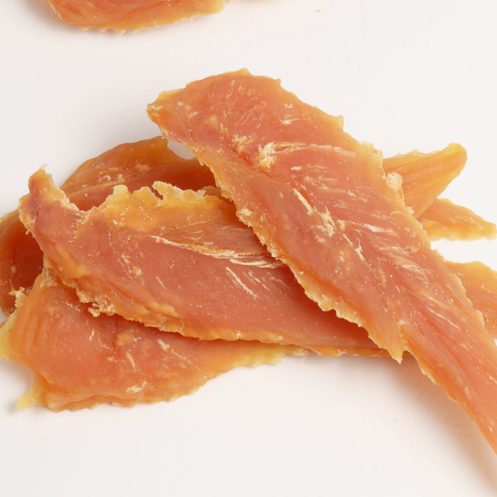 Jack PetPals chicken breast treats 12oz in a pile, ideal for training and rewarding dogs