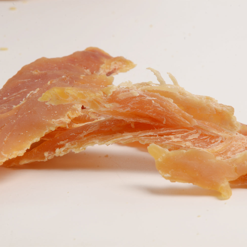 Jack PetPals chicken breast treats 12oz displayed in a natural layout, showcasing the texture and flavor