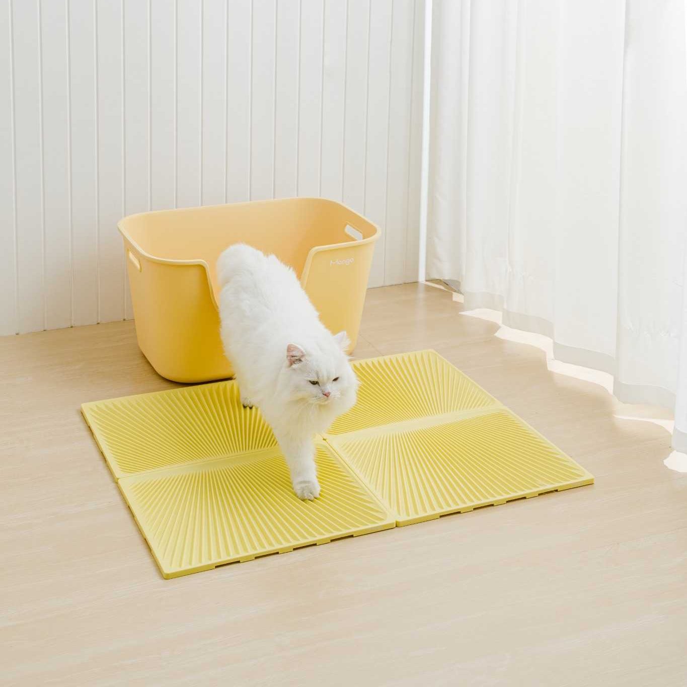 MangoPets large cat litter trapping mat in yellow with raised edges to catch litter from paws
