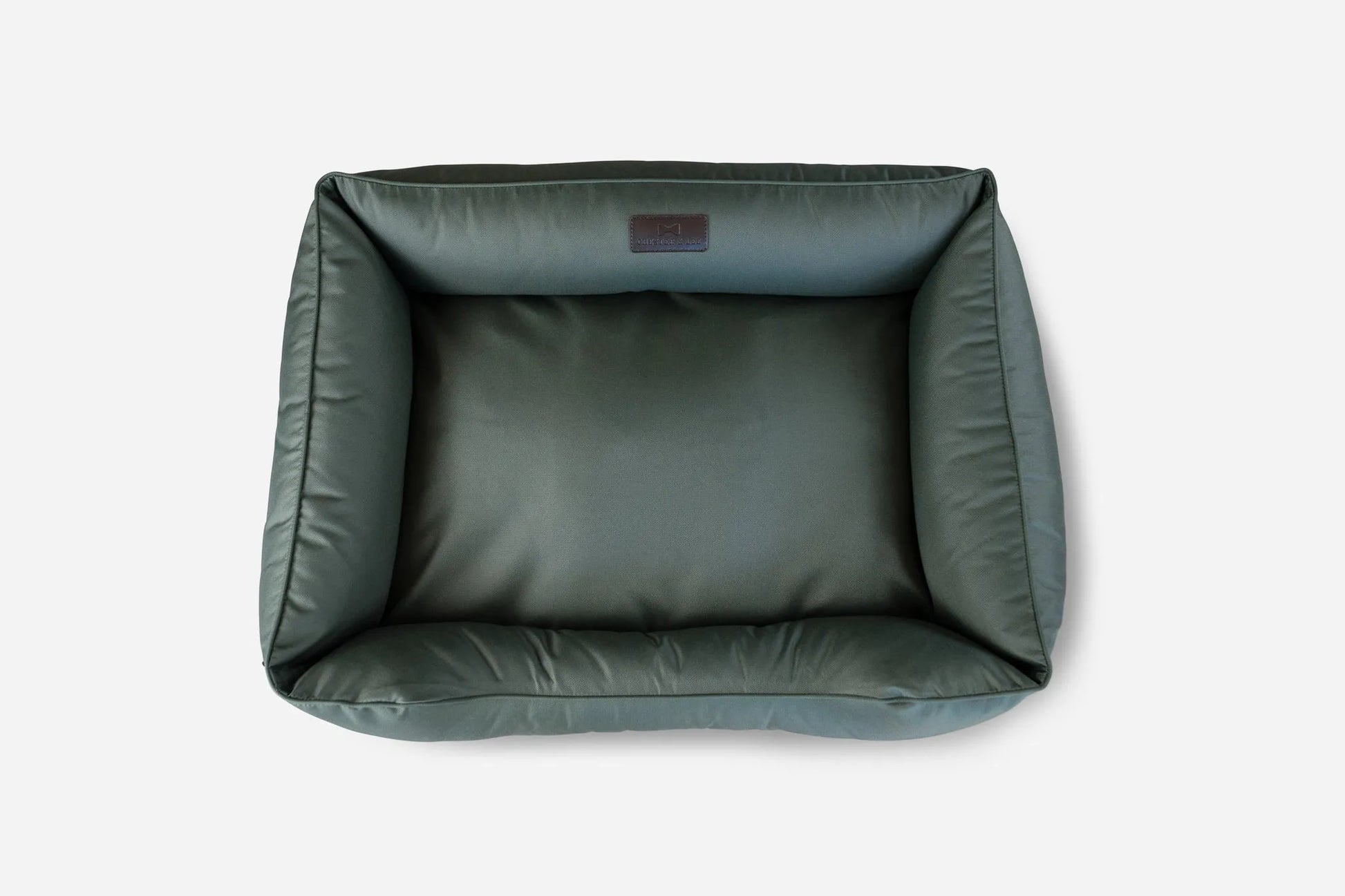 Large waterproof rectangle dog bed in green by Chester & Lee, available in medium, large, and extra-large sizes.
