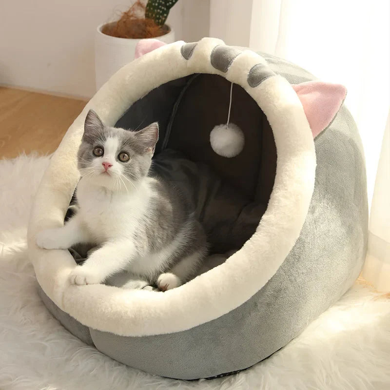Cozy gray Tail Chasers cat cave with plush interior, ideal luxury cat beds for indoor cats