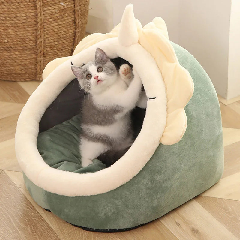 Luxury cat bed for indoor cats shaped like a cozy cave with soft plush interior and playful design