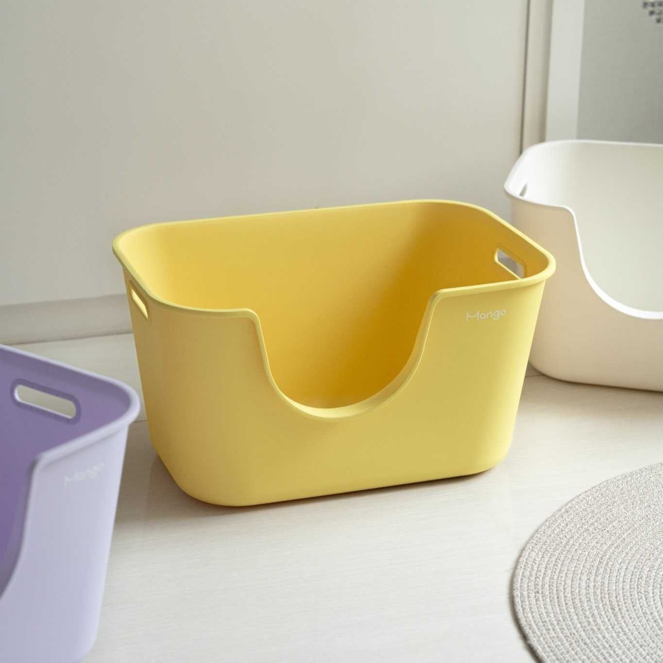 Butter colored litter box for cats by MangoPets designed for easy cleaning and comfort