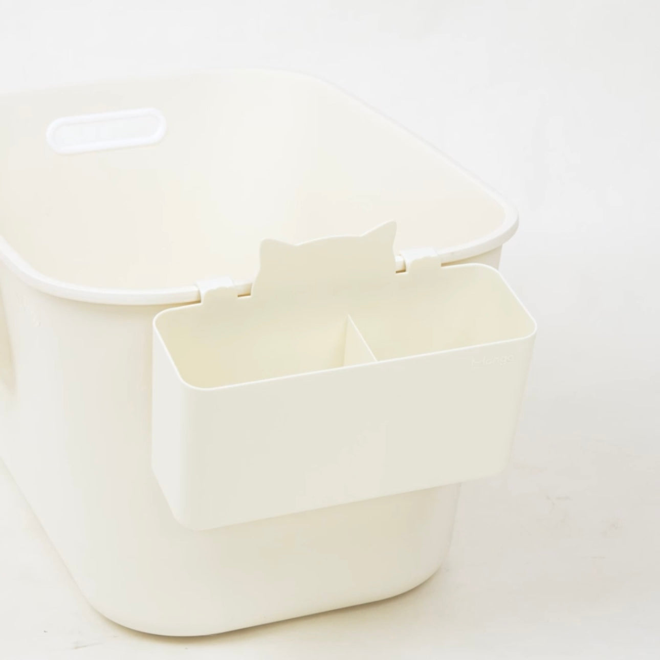 MangoPets cat litter box storage bin in white with a removable compartment for accessories