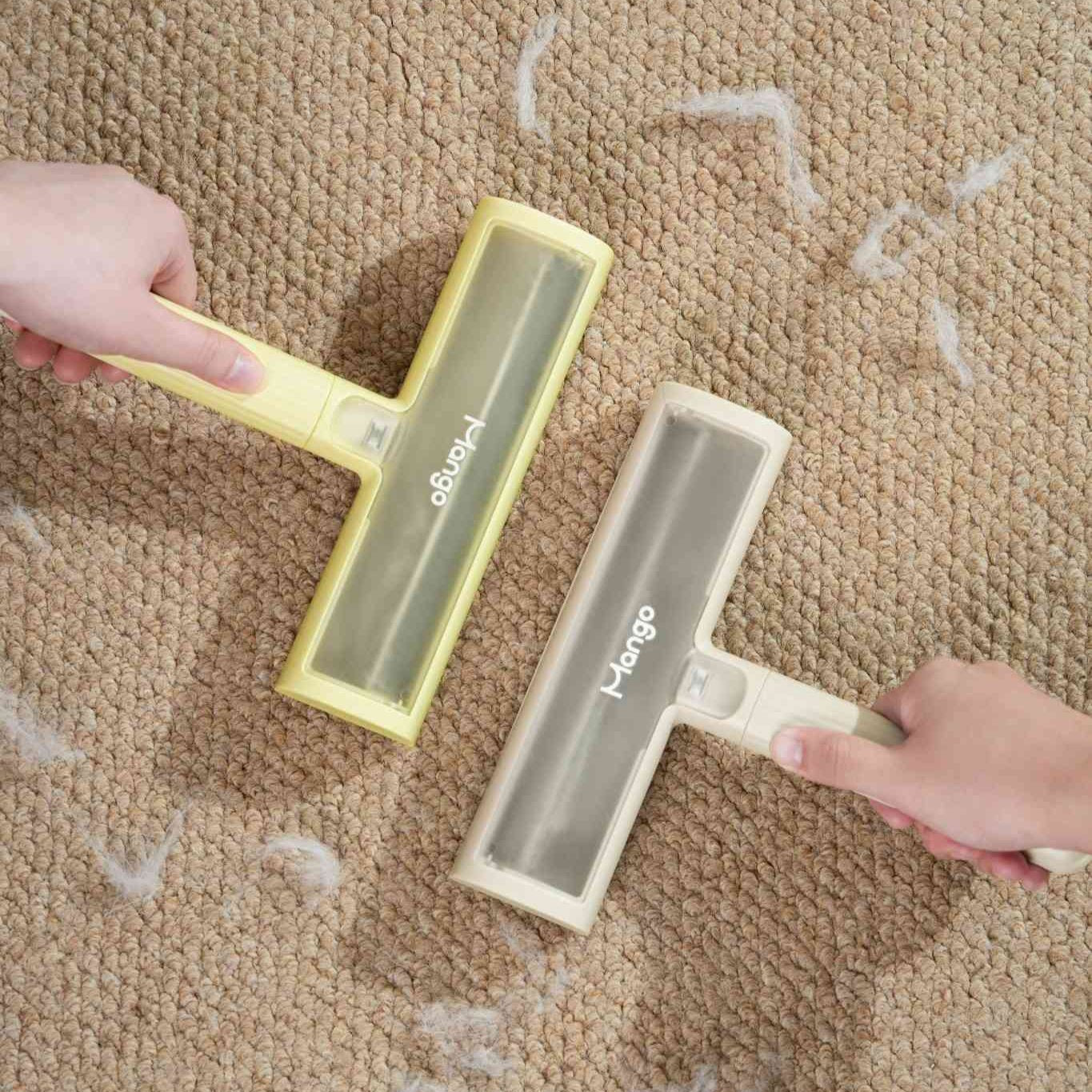 MangoPets reusable lint roller for pets in yellow and cream color, ideal for removing hair from carpets