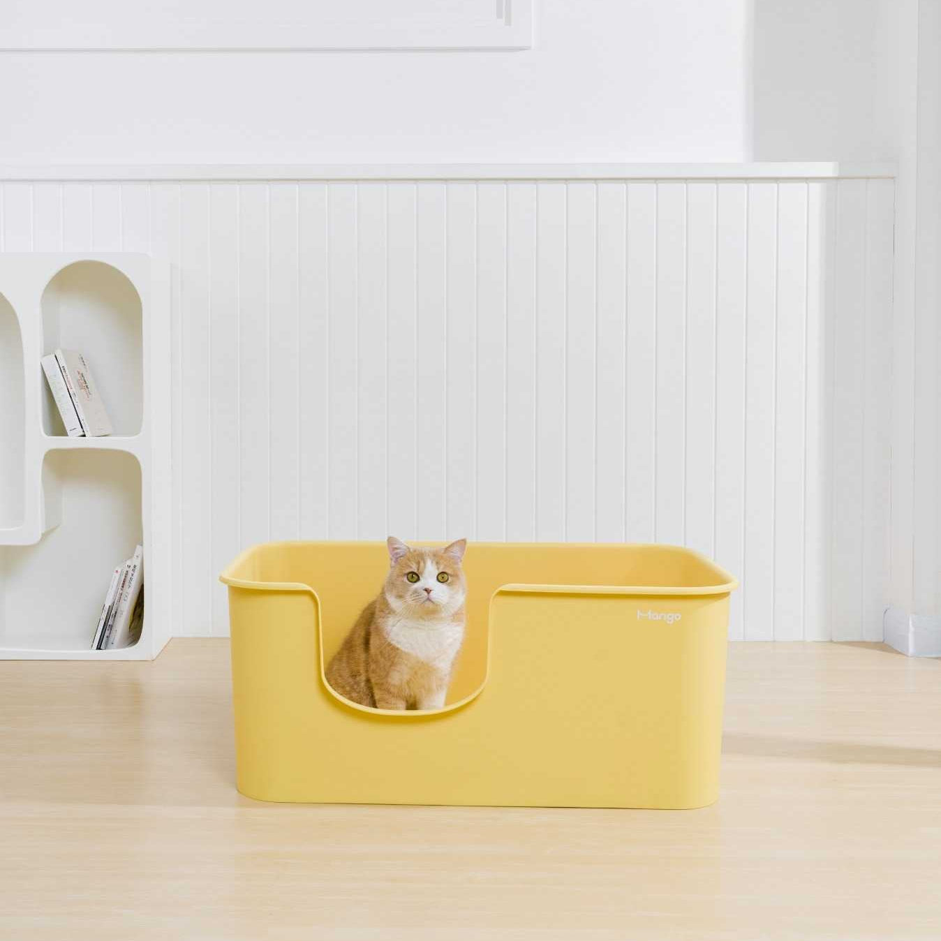 MangoPets XXL litter box for multiple cats in bright yellow with a happy cat inside