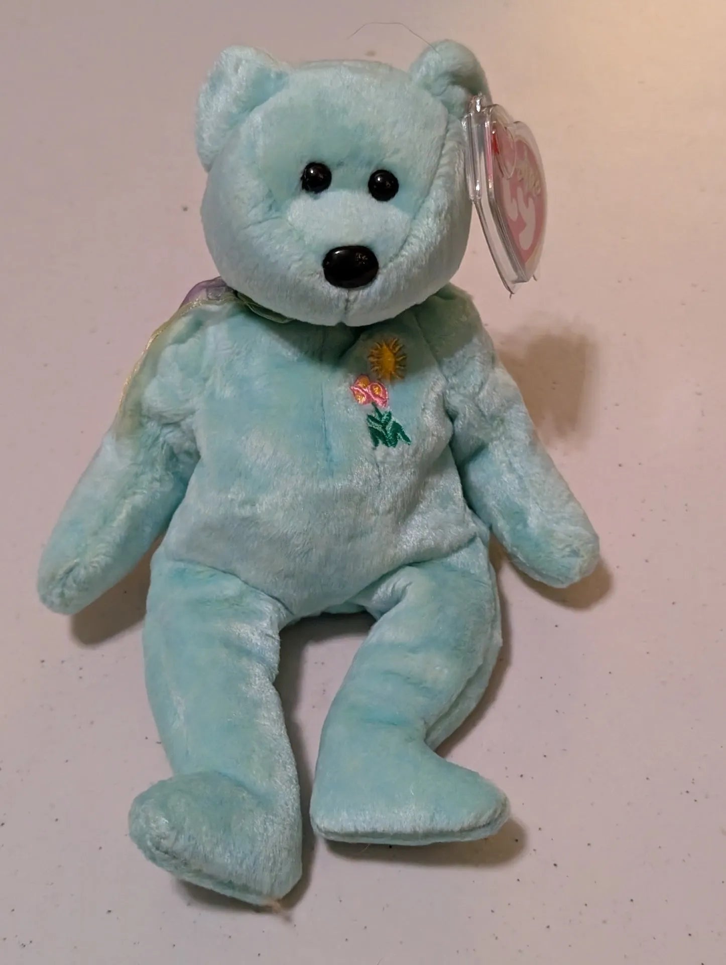 Merritt Island Curios - Spring the Bear Ty Beanie Baby Light Blue 2002 MWMT Retired