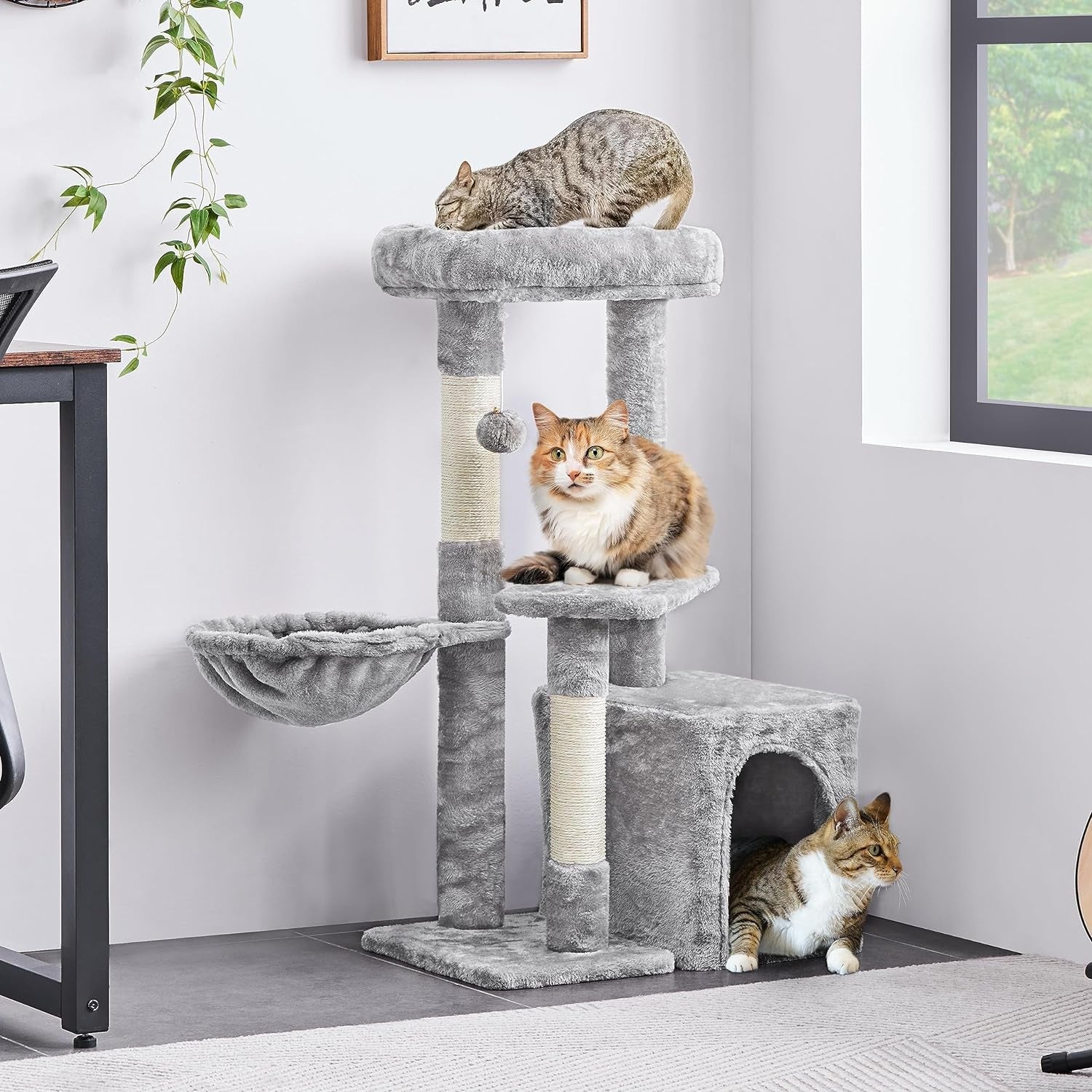 Purrfect Pet Kingdom multi-level cat furniture featuring platforms, scratching posts, and cozy hideaway for cats