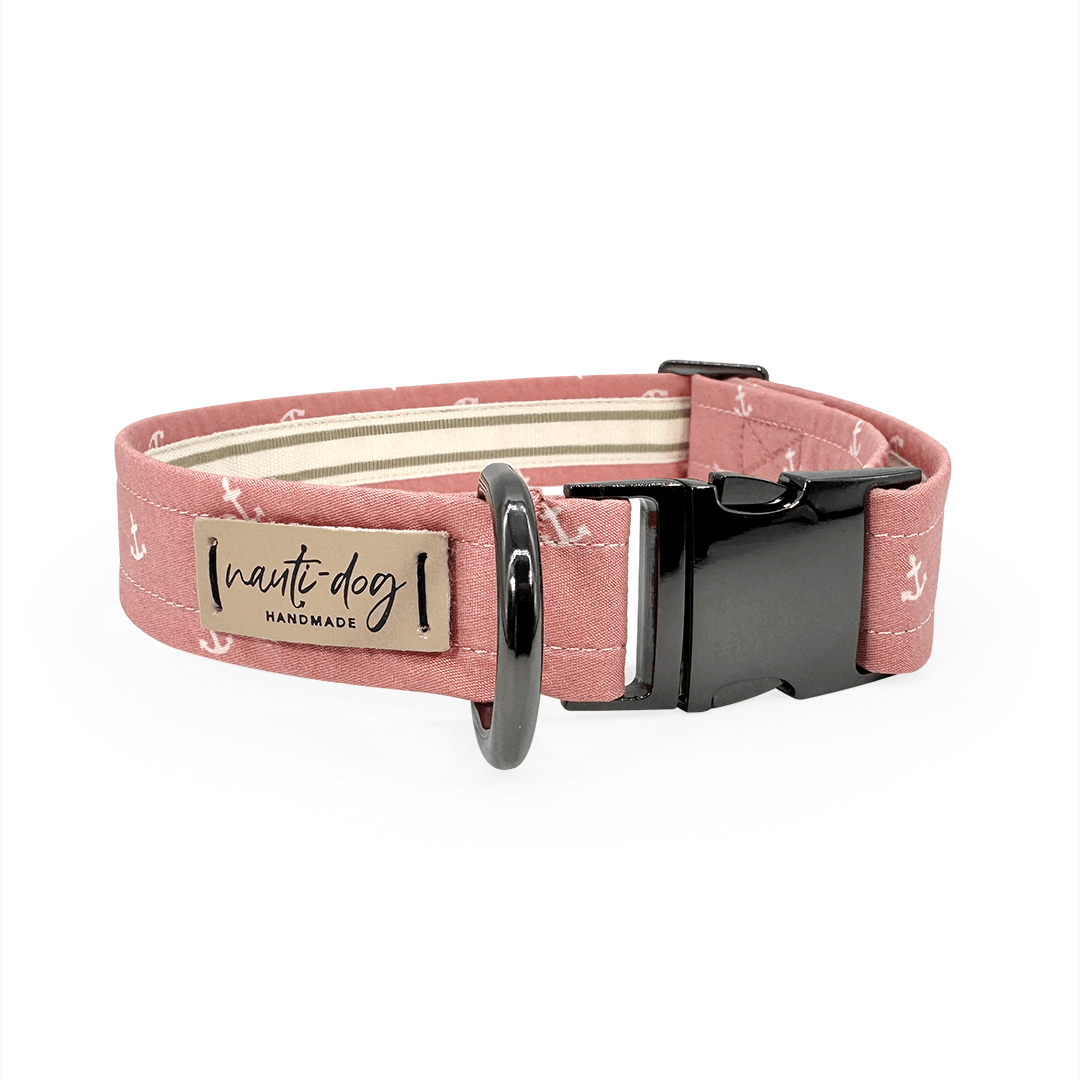 Adjustable pink dog collar for pets with a stylish anchor design and durable buckle