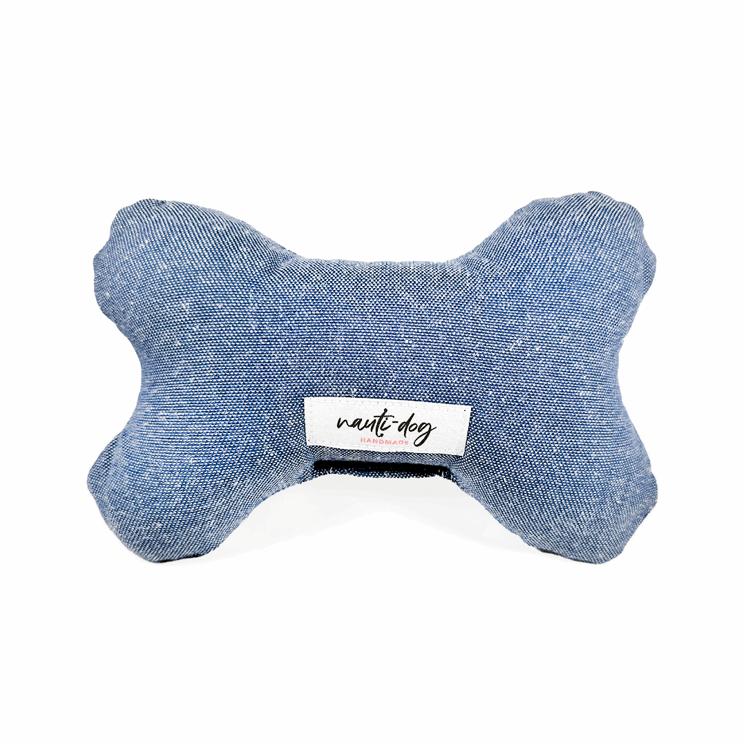 Chambray dog toy with squeaker in bone shape, handmade by Nauti-dog for playful pups