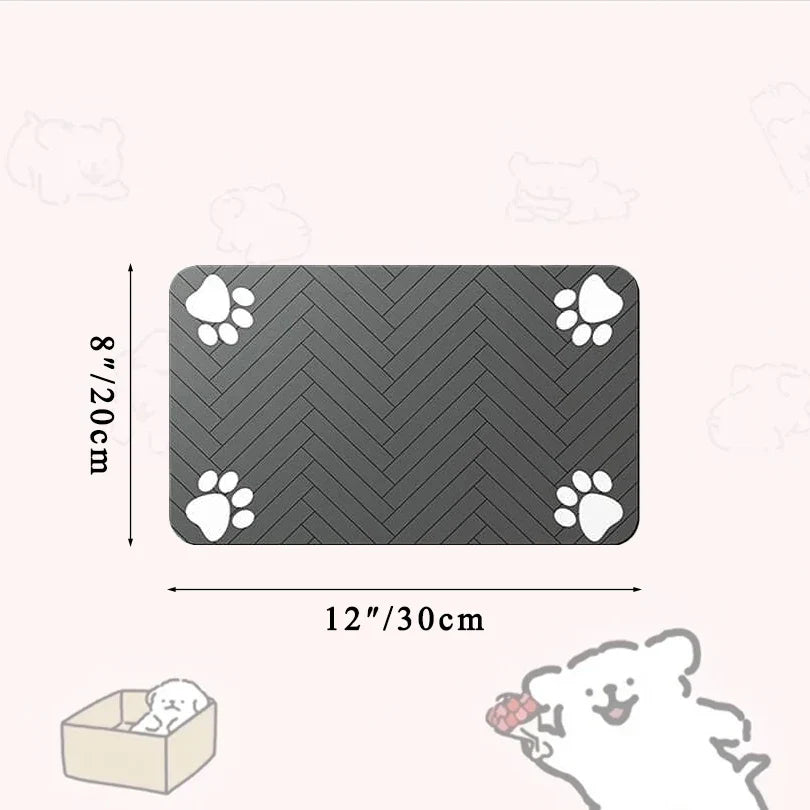 Non-slip dog and cat food mat in dark gray with paw print design, measuring 12x8 inches