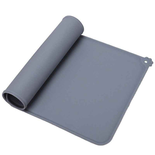 Gray rolled silicone non-slip feeding mat for pets by Purrfect Pet Kingdom for gourmet bowls and dishes