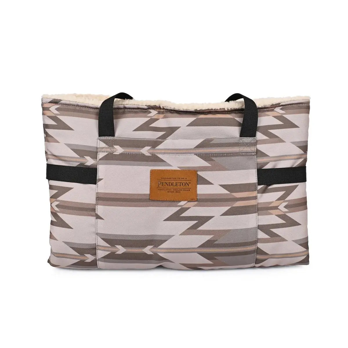 Pendleton portable dog bed with a stylish arrow pattern and comfortable fleece lining for outdoor adventures