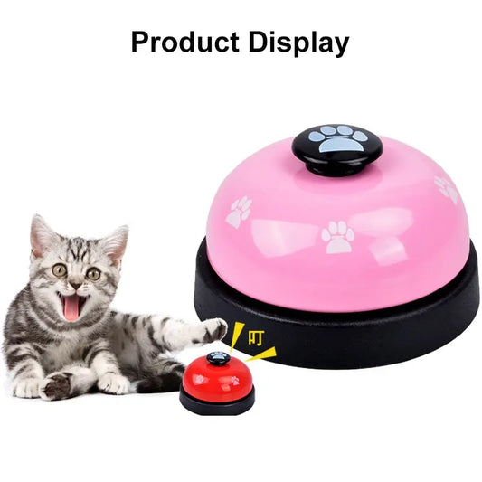 Pink pet behavior training bell with cat displaying how to use it for effective communication
