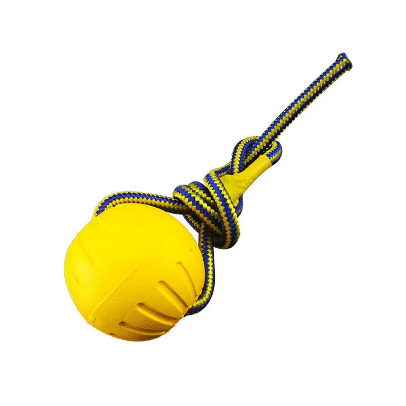 Bright yellow Tail Chasers pet chew toy for water play with a durable rope for fetching