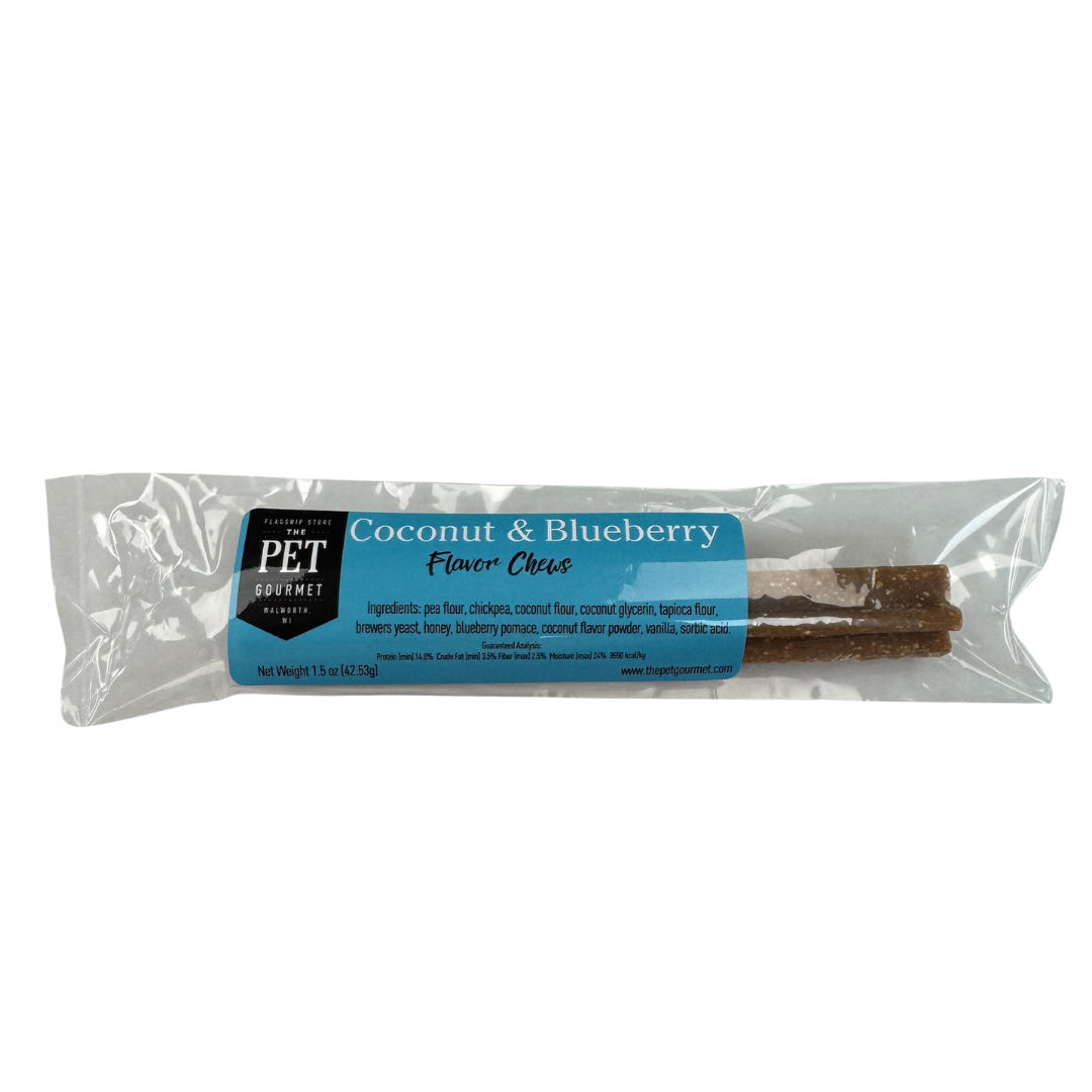 The Pet Gourmet blueberry coconut dental sticks for dogs in a clear package, promoting dental health