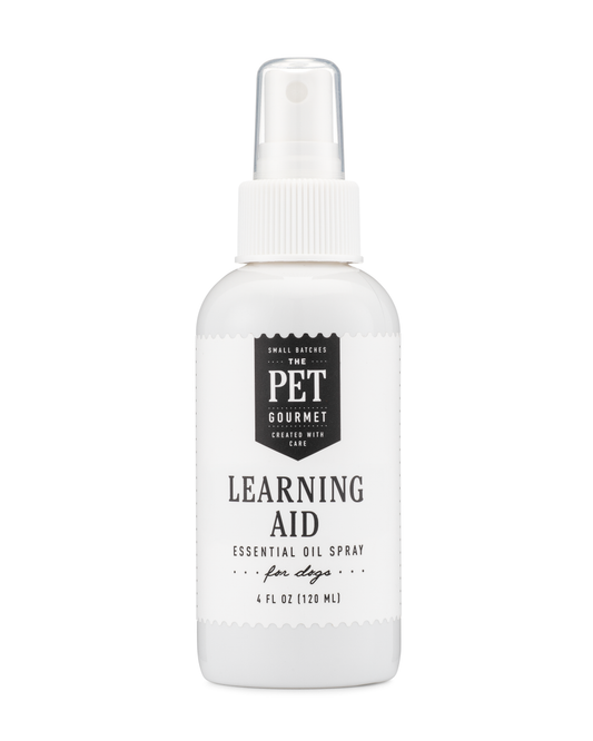 The Pet Gourmet Learning Aid Spray for Dogs in a 4 oz bottle, essential oil formula for effective pet training