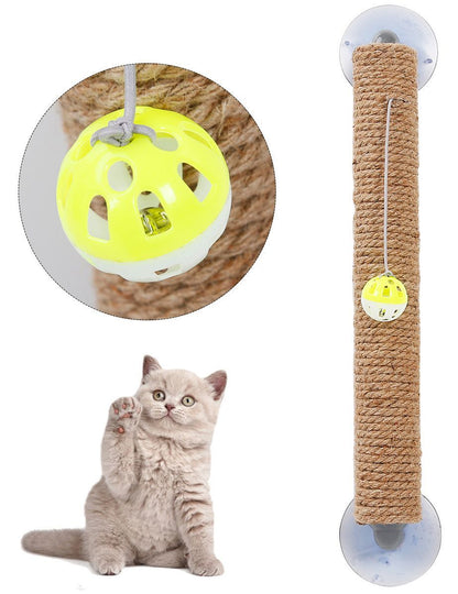 Pet Life tan sisal rope wall scratcher with suction cups, hanging yellow ball toy, and a grey kitten reaching up.