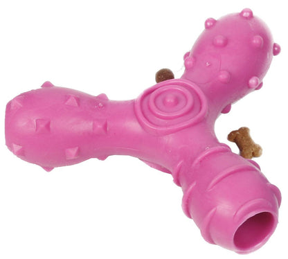 Pink rubber Y-shaped dog toy with textured bumps and ridges for treat dispensing and interactive enrichment.