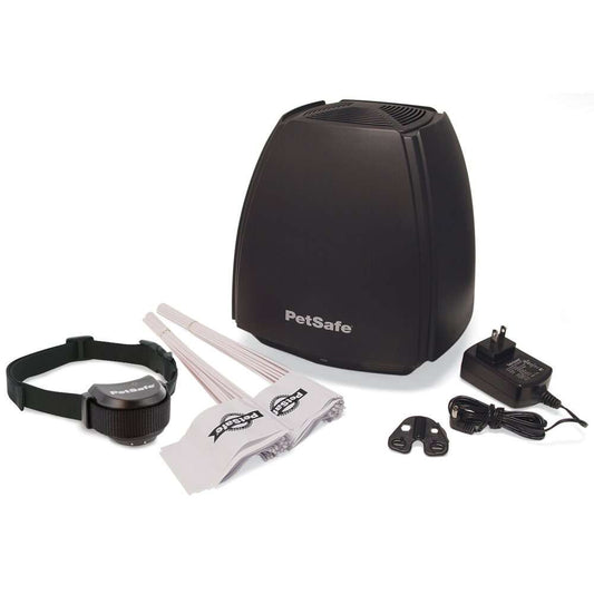 Perimeter Technologies Wireless Dog Fence system components including receiver collar, transmitter, and boundary flags