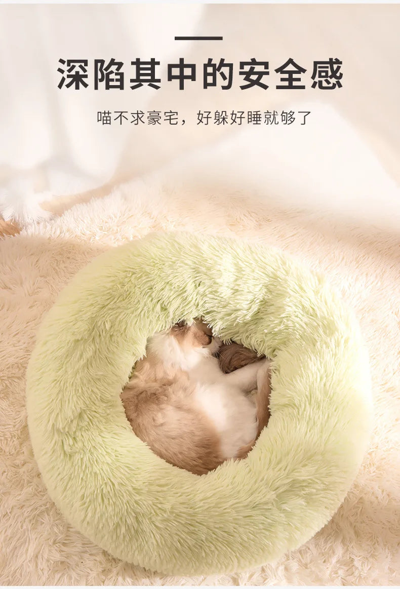 Cozy round plush cat bed for cold weather made by Tail Chasers, perfect for keeping pets warm and comfy