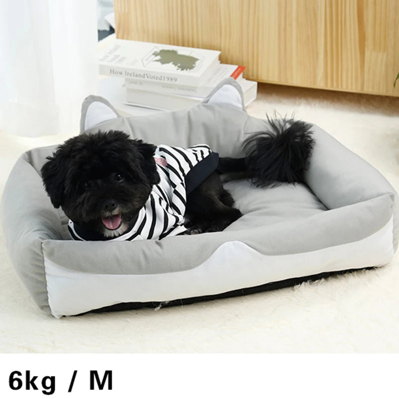 Plush dog and cat bed for comfort with soft gray fabric and a cute design for pets
