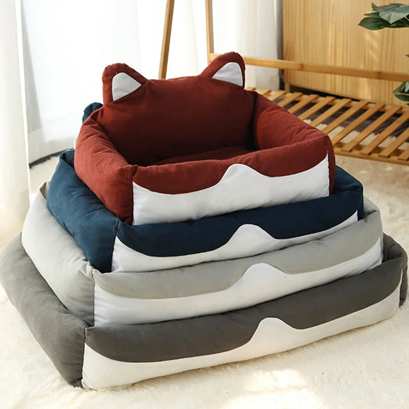 Cozy plush dog and cat bed for comfort in three sizes with playful design and soft materials