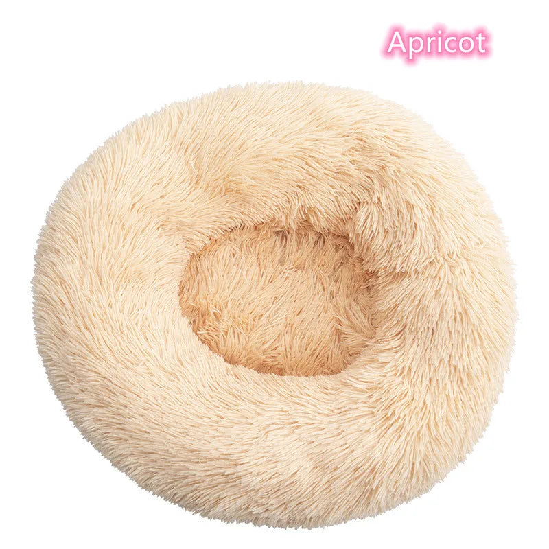 Apricot round plush dog bed for anxiety with soft, fluffy texture for ultimate comfort