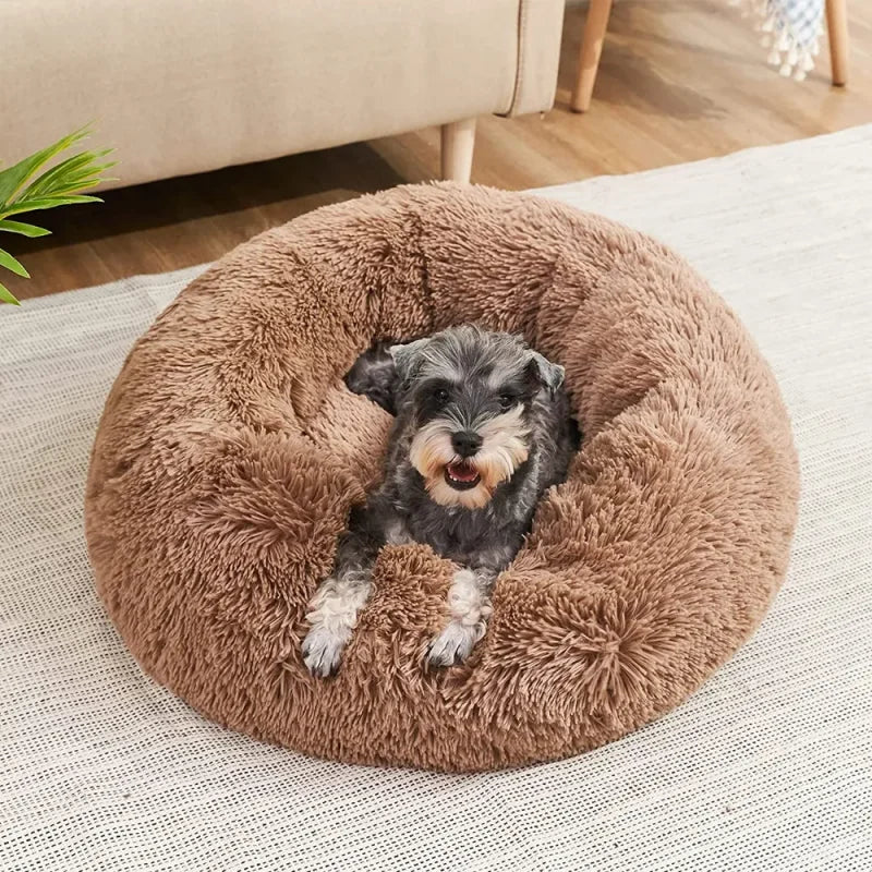 Cozy Tail Chasers round plush dog bed for anxiety featuring a soft, fluffy design for ultimate comfort