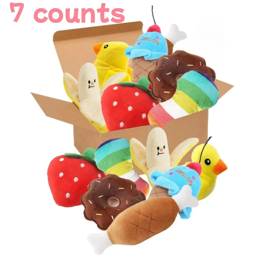 Plush puppy toy set with assorted colorful toys including ice cream, donuts, and a duck in a box