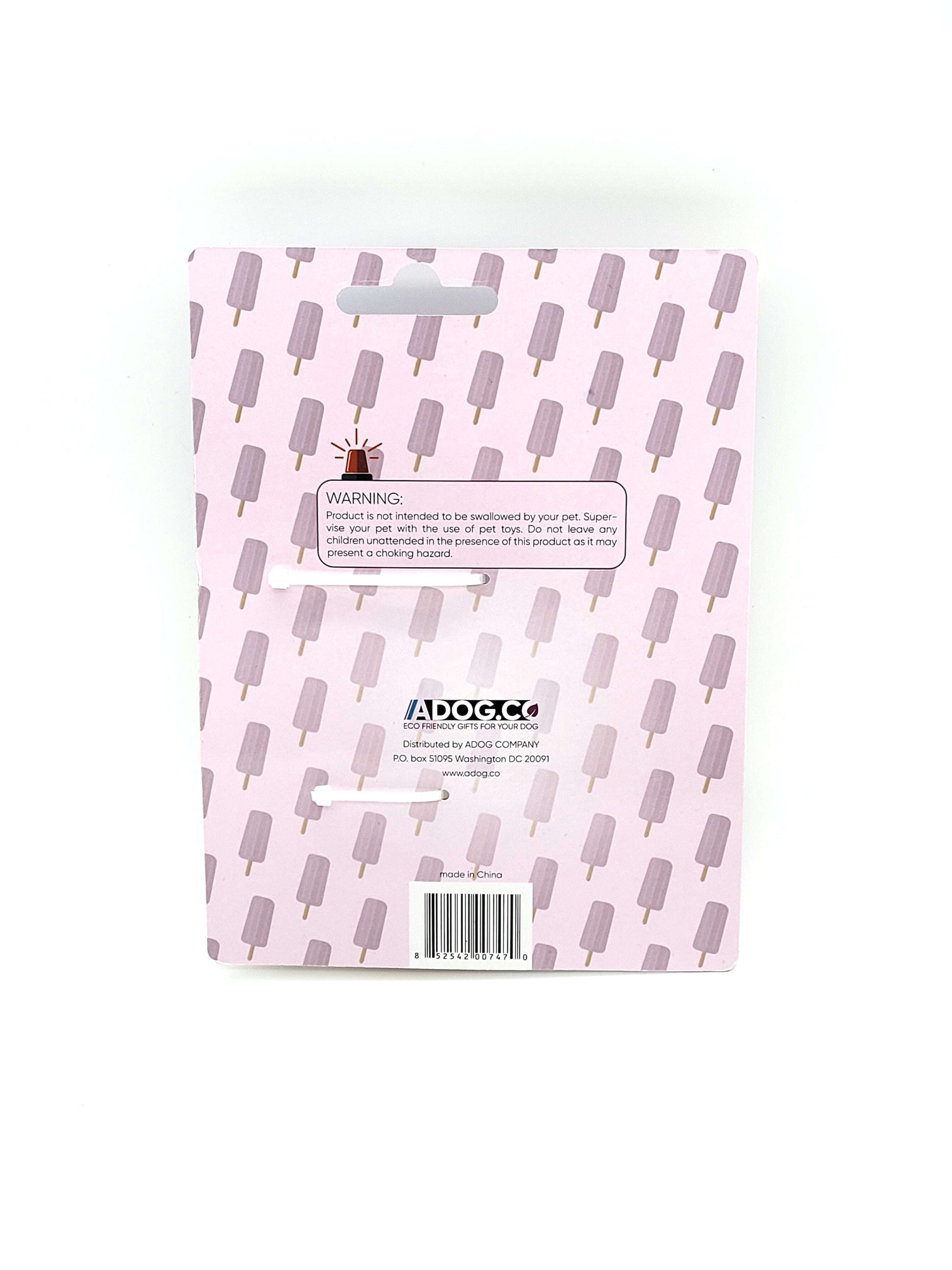 Packaging of a popsicle-shaped rubber dog chew toy by Purrfect Pet Kingdom with a playful design