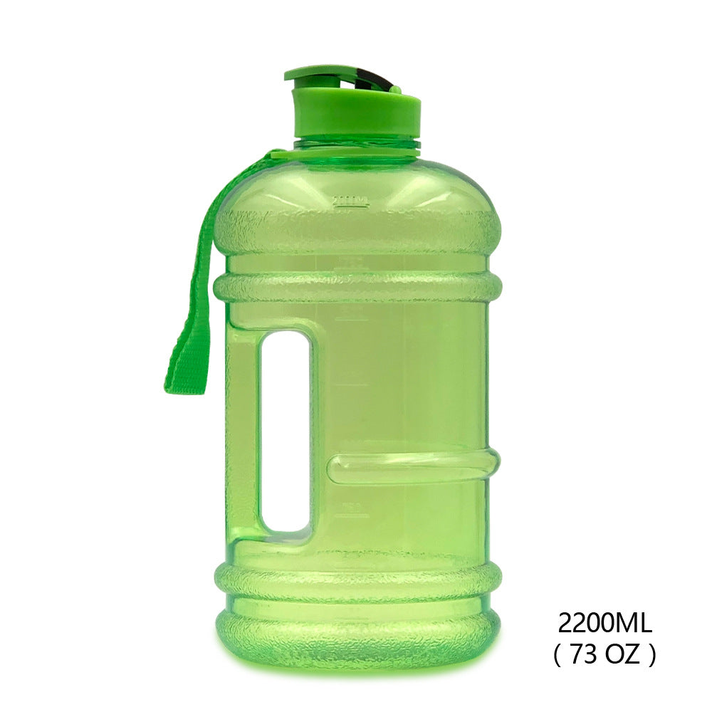 Green portable hydration jug for workouts with a convenient handle and 73 oz capacity