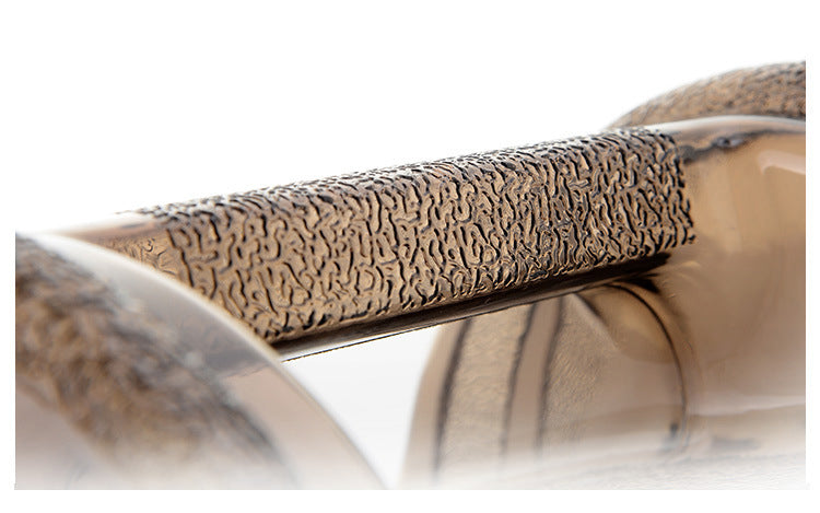 Close-up of V.I.P Digital Presence portable hydration jug for workouts featuring a textured grip