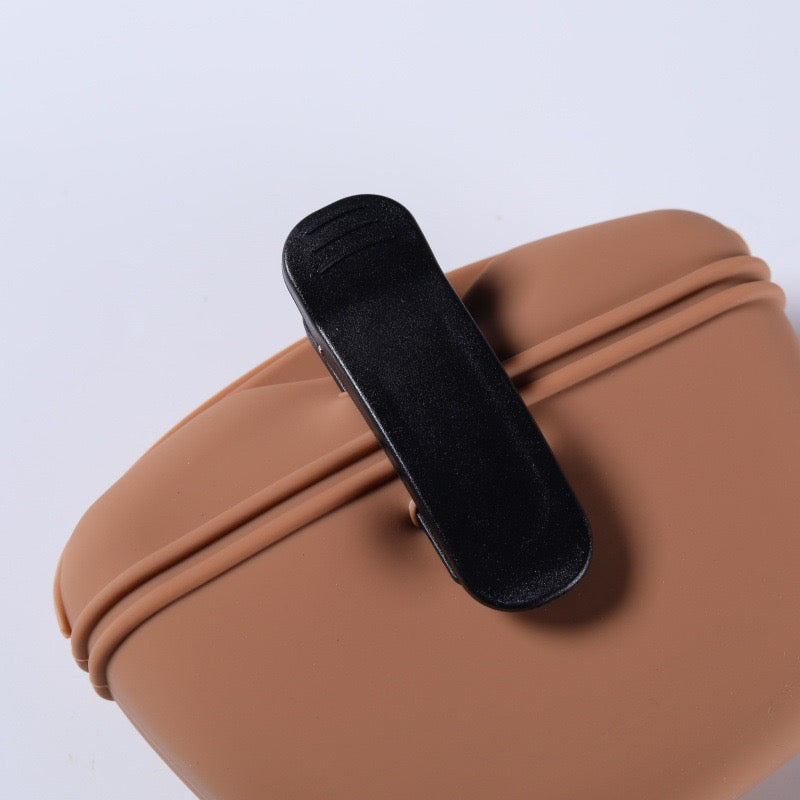 Portable pet treat pouch in brown with a secure clip for easy carrying during training sessions