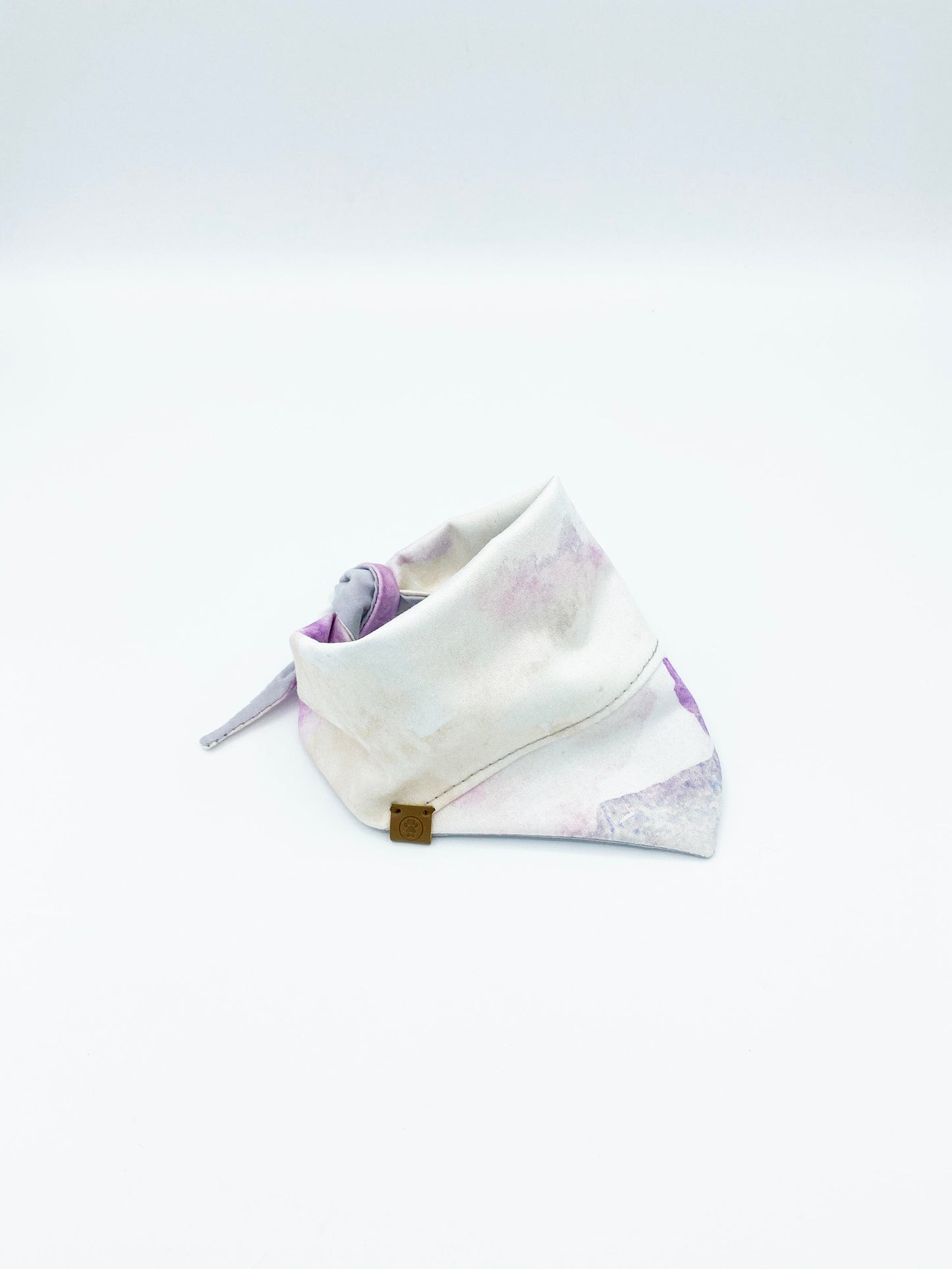 Purple watercolor pet bandana designed by Bespoke Paws with a stylish, colorful pattern