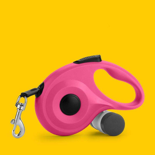 Purrfect Pet Kingdom retractable dog leash with poop bag holder in pink with ergonomic handle