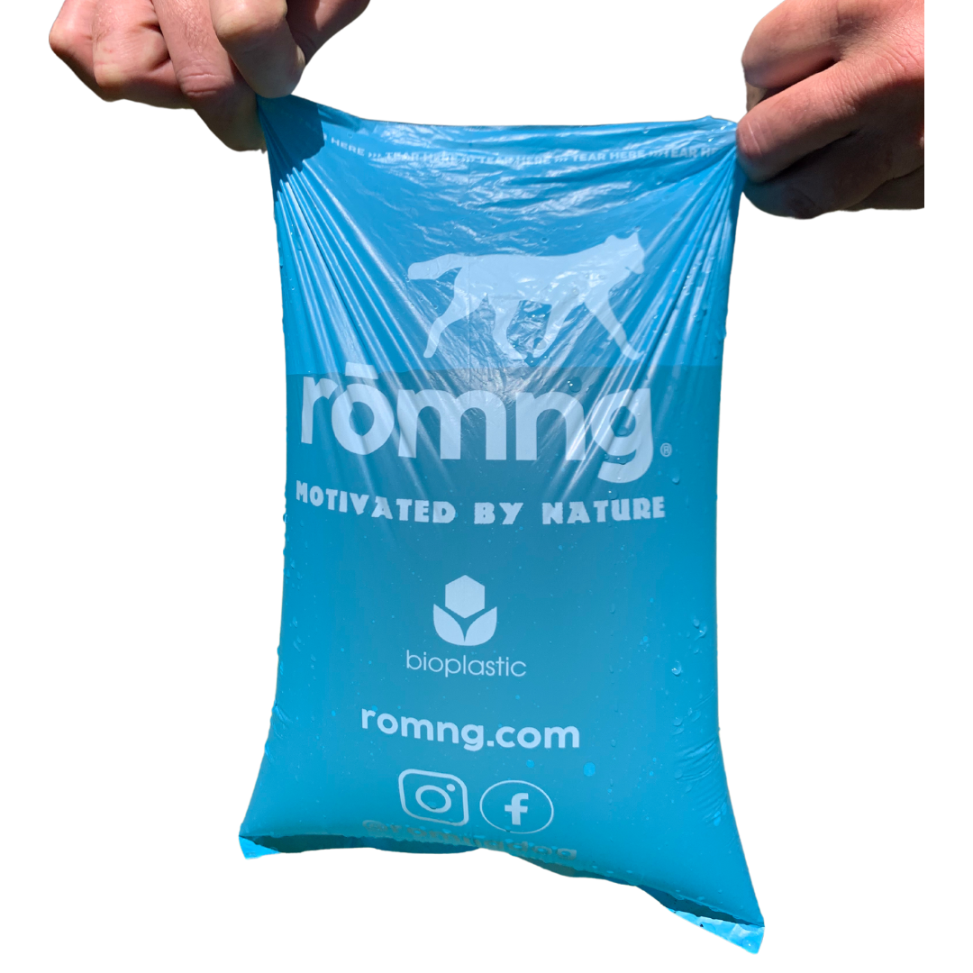 Rōmng biodegradable dog poop bags in a blue color for eco-friendly pet waste disposal