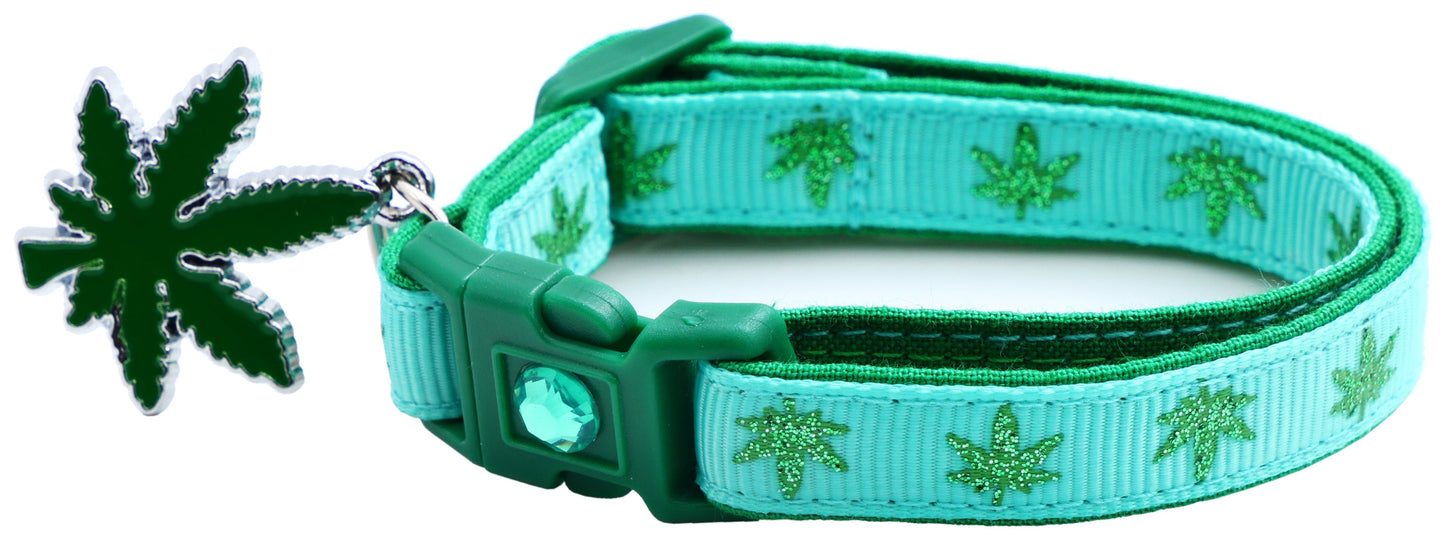A green adjustable cat collar for pets featuring a leafy design and snap buckle, ensuring a safe fit